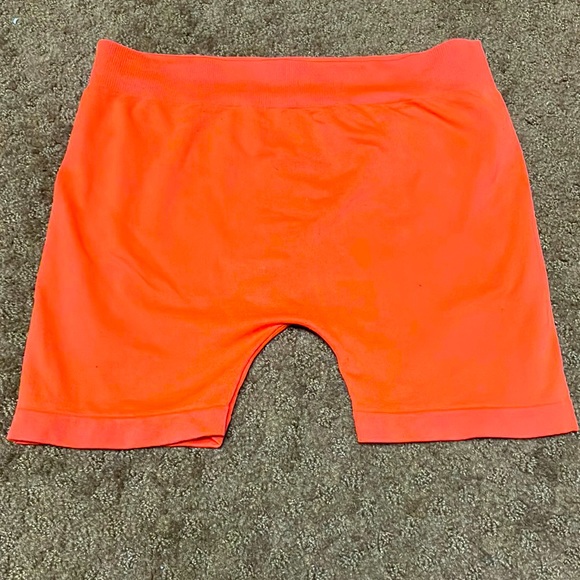 Orange stretch dance shorts one size, but they’d probably fit XS or SMALL EUC - Picture 1 of 4